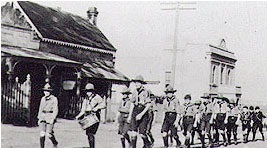 1st north Scout troops marching down Coxs Road