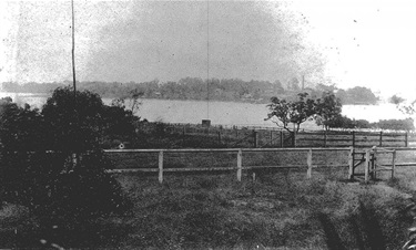 View across the Parramatta River from the approximate location of Bennelong’s grave in c.1900. Remains of J Squire's orchard at Kissing Point, c1900, Mitchell Library SLNSW