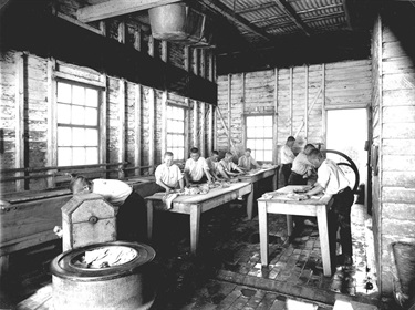 Brush Farm Carpentarian Reformatory in 1910: laundry.  In 1894, three quarters of a century after it was built, Brush Farm House became the Carpentarian Reformatory which was established to train boys in useful agricultural skills and trades and to prepare them for adult life. It was described as ‘an institution without walls’. Ryde Library Service. Acc. 4954653. Brush Farm / 4