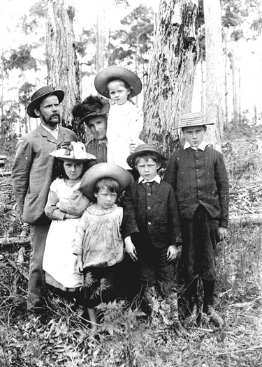 Mr & Mrs Christie with their children, Nell, Nettie, Hugh, Johnnie & Bob, 1893.  Robert Gordon & Mary Christie emigrated from Scotland, and built their house on 22 acres of land they had purchased at Marsfield in 1892. The family cleared the land and built a little wooden house. Here they are dressed in their Sunday best! Ryde Library Service. Acc. 5075858. Christie family / 2
