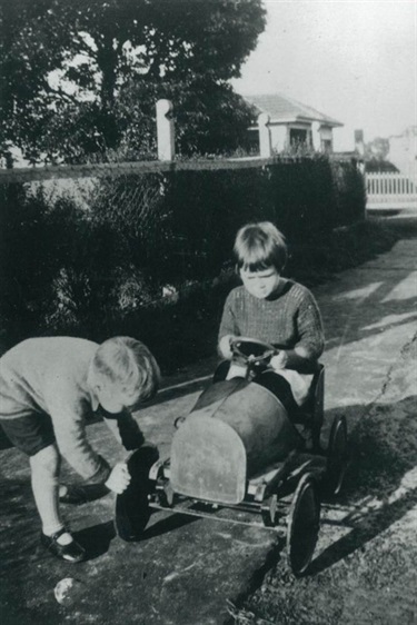 Shirley Beauchamp and her younger brother outside 42 Delange Road, Putney, around 1928. Ryde Library Service. Acc. 5579511. Beauchamp family / 2