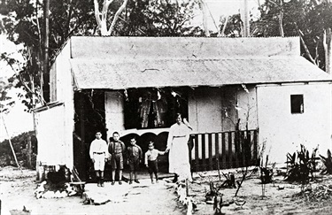 Joyce family outside their bag hut c. 1914 in Pellisier Road, Putney during WWI.  Ryde District Historical Society. Image 5371; negative 205/21.