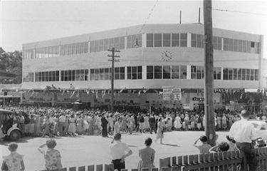 Opening of Palmer’s Department store, Victoria Road, West Ryde. Palmer’s were the first of the large retail chains to open a branch in West Ryde and were followed within a couple of years by branches of two larger city department stores: Ashleys Buckingham and Anthony Horderns. The sign on the corner of the building reveals that the store was opened by popular radio entertainer Jack Davey. Ryde Library Service. Acc. 4954262. West Ryde / 9.
