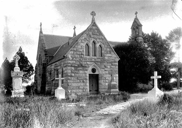 St Charles church & churchyard around 1912. Officially opened November 1857, the entrance to the original church was in Charles Street built in Gothic style based on designs by English Gothic Revivalist architect Augustus Welby Pugin. Most of what is visible today is the reconstruction in the 1930s. The Cemetery was the last resting place for Catholics from Ryde and surrounding districts. Ryde Library Service. Acc. 5004721. St Charles Church, Ryde / 3.