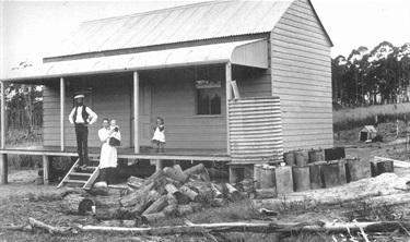 Christie family, Dunbar, Sobraon Road, Marsfield, 1890s. The Christie family emigrated from Scotland. Initially they lived in Balmain/Rozelle and in 1892 bought 22 acres of land in Marsfield. At first they built a simple shed; later a more substantial house as shown here, complete with dog kennel! Originally an orchard was planted on the land but some years later Robert and his eldest son formed a partnership to establish Dunbar Poultry Stud. Ryde Library Service. Acc. 5096251. Christie family / 3.