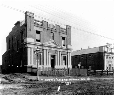 School of Arts and Masonic Temple, Parkes Street, Ryde, 1912. The Ryde School of Arts, located at the corner of Parkes Street and Devlin Street, was opened in June 1905. It was demolished in the 1960s to allow for the widening of Devlin Street though a remnant wall can still be seen running parallel to the eastern side of the Masonic Temple. Ryde Library Service. Acc. 5485991. Parkes Street, Ryde / 13.