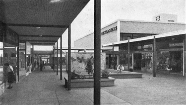 The mall in the new Top Ryde Regional Shopping Centre in 1958. The Top Ryde Regional Shopping Centre opened in November 1957 with a department store and 41 shops with parking for about 400 cars. It was a new concept in ‘neighbourhood’ shopping based on an American model. Top Ryde featured a mall, complete with an abstract sculpture by Gordon Andrews. The majority of prestige commercial buildings erected during the 1950s and early 1960s included some form of public art so Ryde’s sculpture no less than the mall itself, was a measure of the modernity of the new centre. Ryde Library Service. Acc. 5089441. Top Ryde Shopping Square / 2.