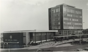 Ryde Civic Centre and Centenary Library, 1971. The administration block of the Ryde Civic Centre which was opened in 1964 was the first stage of a larger complex that was to include a ballroom with a capacity of 1000, a concert hall with capacity of 500, a public library and a pedestrian subway to connect the site with the shopping centre. The ballroom and pedestrian subway never eventuated but the library and civic hall were unveiled in November 1970 for the centenary of the municipality. Ryde Library Service. Acc. 508959A. Ryde Civic Centre / 10.