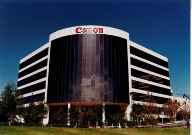 Canon Australia, Thomas Holt Drive, Macquarie Park, 1991. Much of the area we now called Macquarie Park was, until the 1950s, covered by green belt zoning under the County of Cumberland Planning Scheme. The scheme faced opposition from many sectors. In December 1959 1,700 acres in the Marsfield-North Ryde green belt were released for re-zoning. In March 1963 a decision was finally made to build the university at North Ryde. The underlying principle agreed by the State Planning Authority and Ryde Council was for the development of a North Ryde Industrial area based on the same concept as the development of the industrial area surrounding Stanford University in San Francisco. Ryde Library Service. Acc. 5482747. North Ryde Industrial Area / 1.