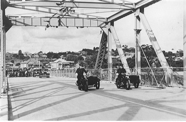 Mounted police escort leading the official party across Ryde Bridge prior to the opening ceremony, 7 December 1935. The original bridge was opened on 7 December 1935 which resulted in the punt that operated from Bowden Street, Meadowbank to Blaxland Road, Rhodes ceasing operation. The bridge was financed with a grant of £53,000 from unemployment relief and a loan of £80,000. Tolls were introduced to repay the loan. Ryde Library Service. Acc. 5483735. Ryde Bridge / 6.