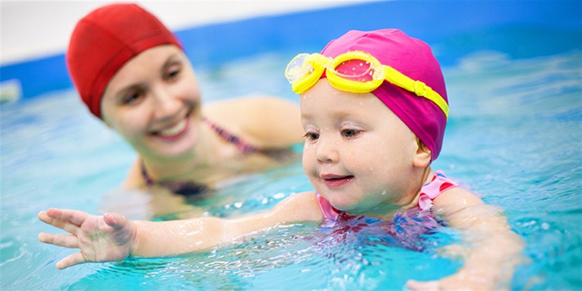 A child learning to swim