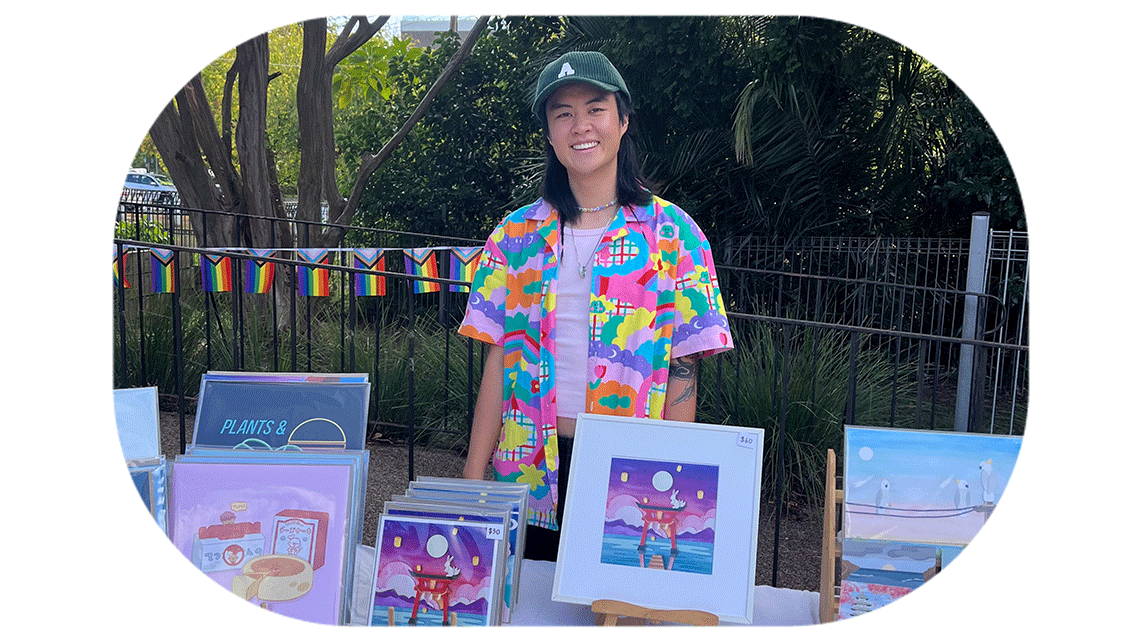 Asa selling art at a stall