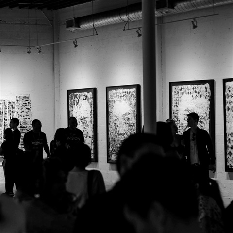 Photo of people at an exhibition