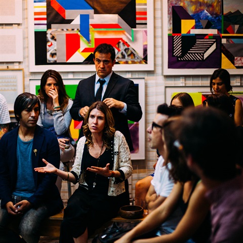 Photo of a group of people having a discussion