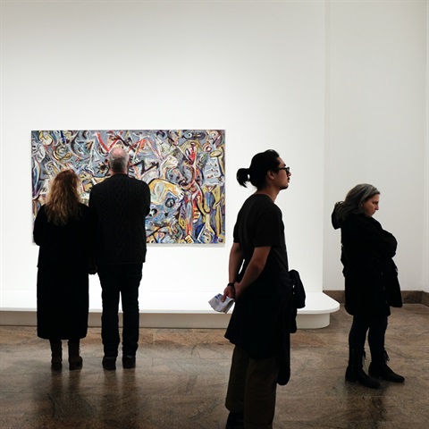 Photo of people at an exhibition