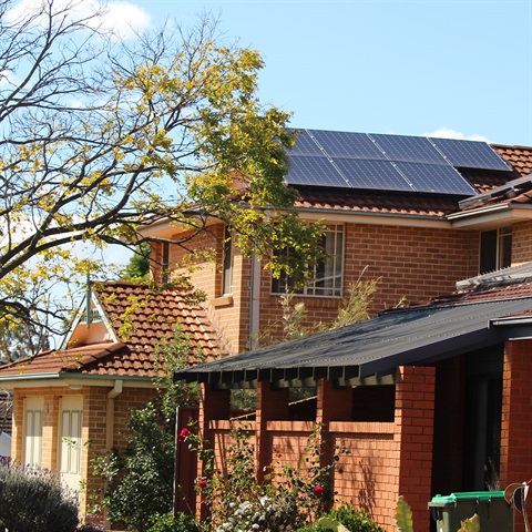 House with roof with solar panels