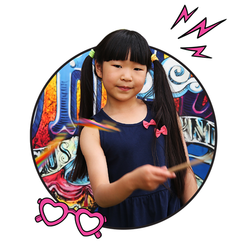Young girl twirling a ribbon