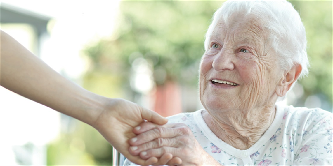 Old lady holding someone's hand