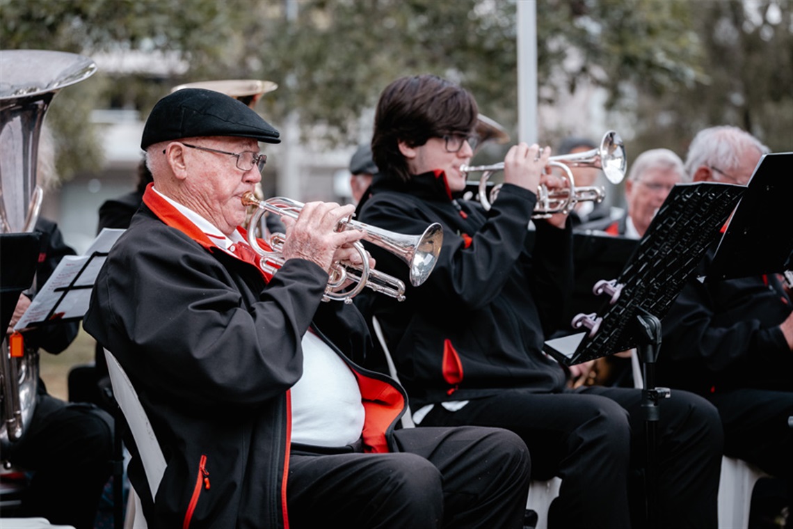 Band members playing brass instruments