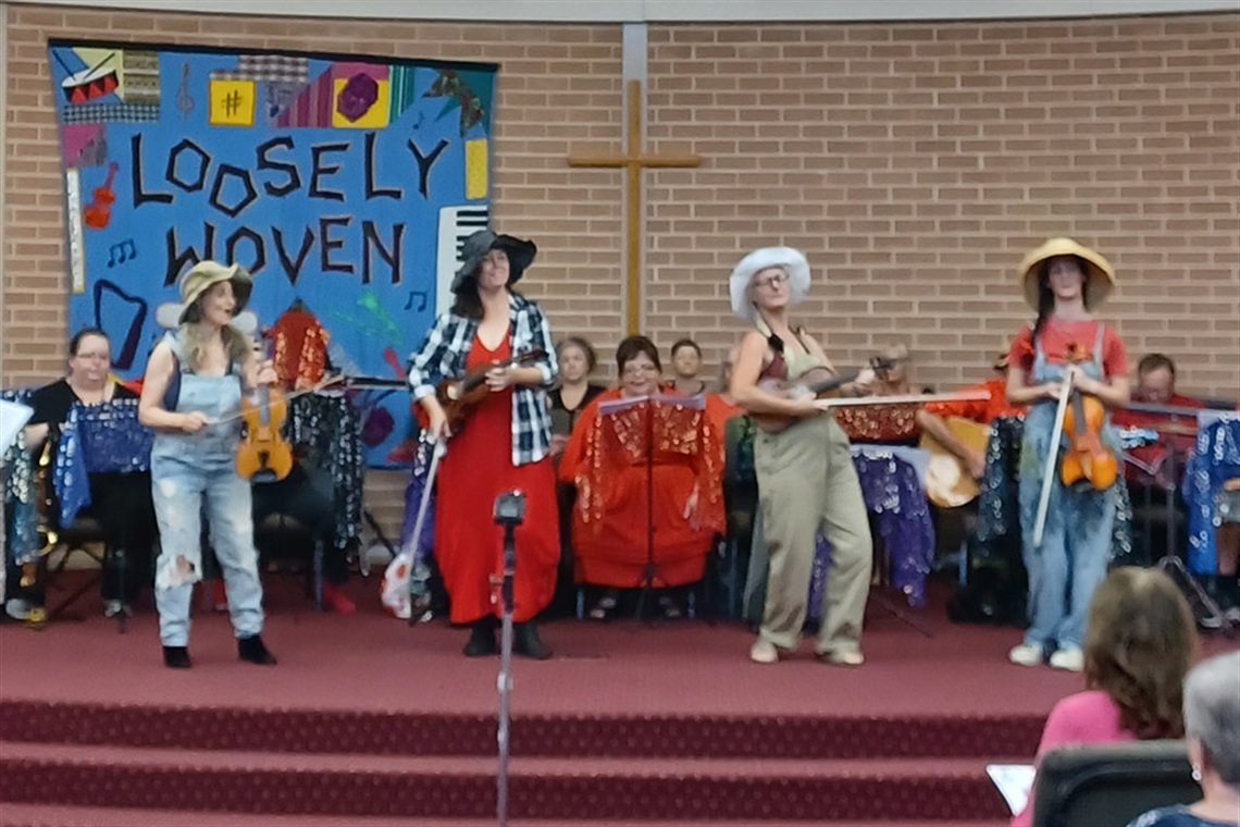 Musical performance on stage at Eastwood Uniting Church