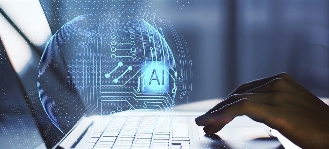Hand using laptop overlaid by design with circuit board patterning