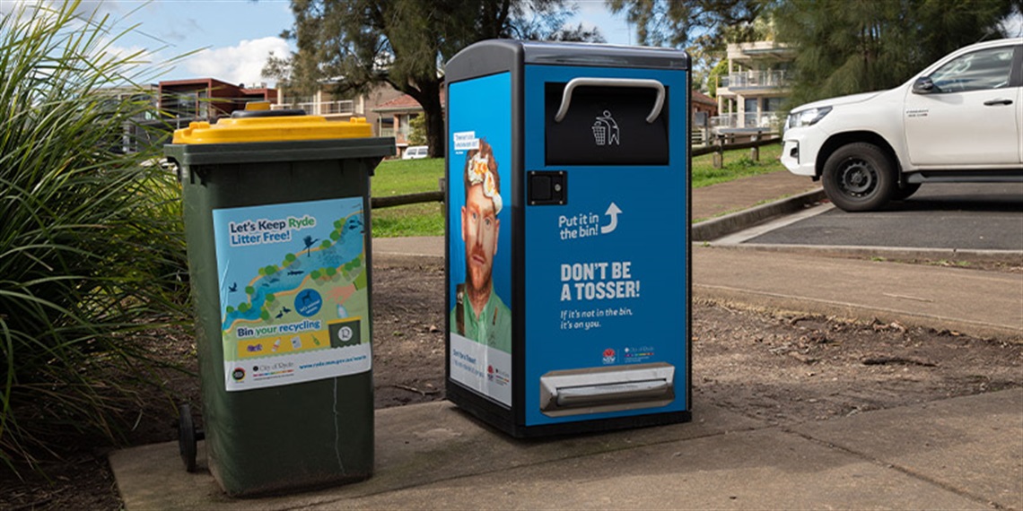 Photo of a recycling bin and a smart waste bin