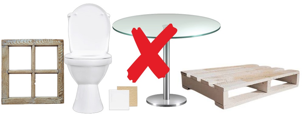 selection of items not collected at kerbside including a glass window, toilet bowl, tiles, glass table and wooden pallette