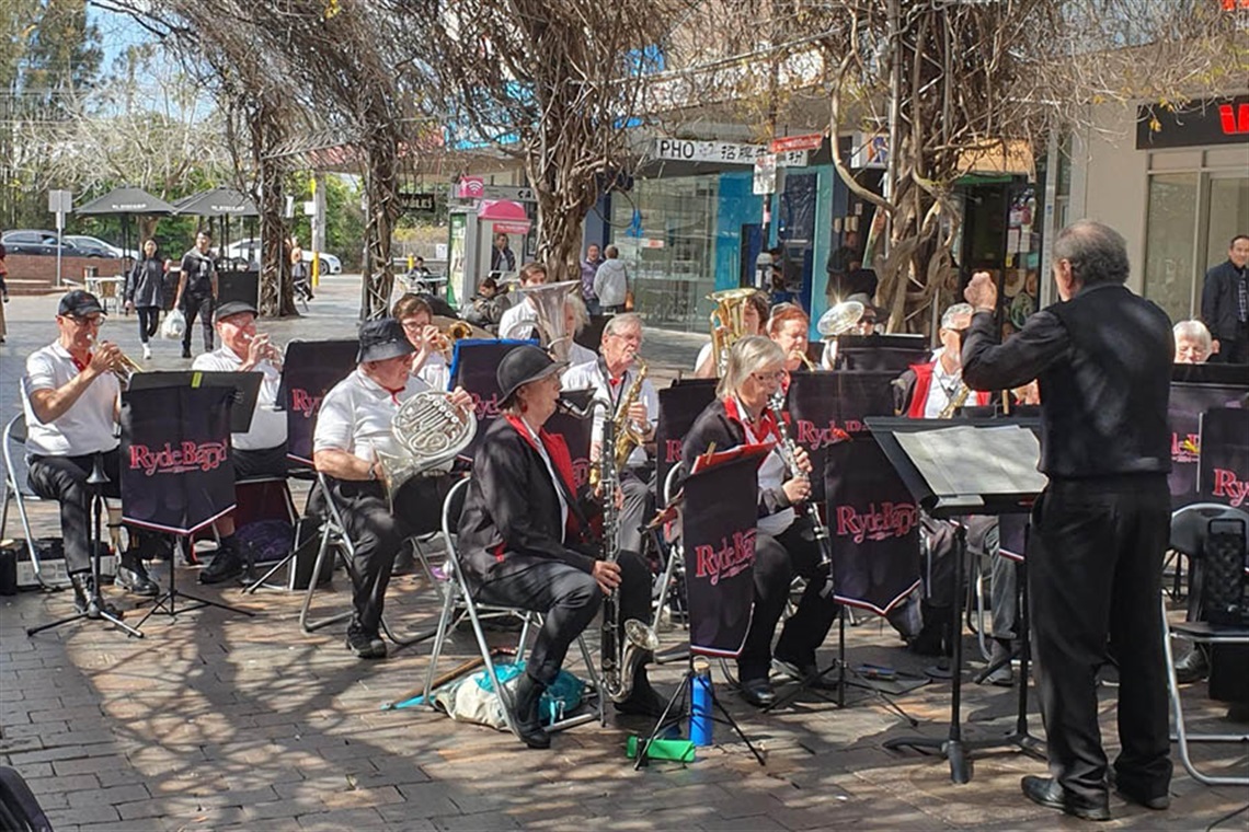 Band playing free concert in public